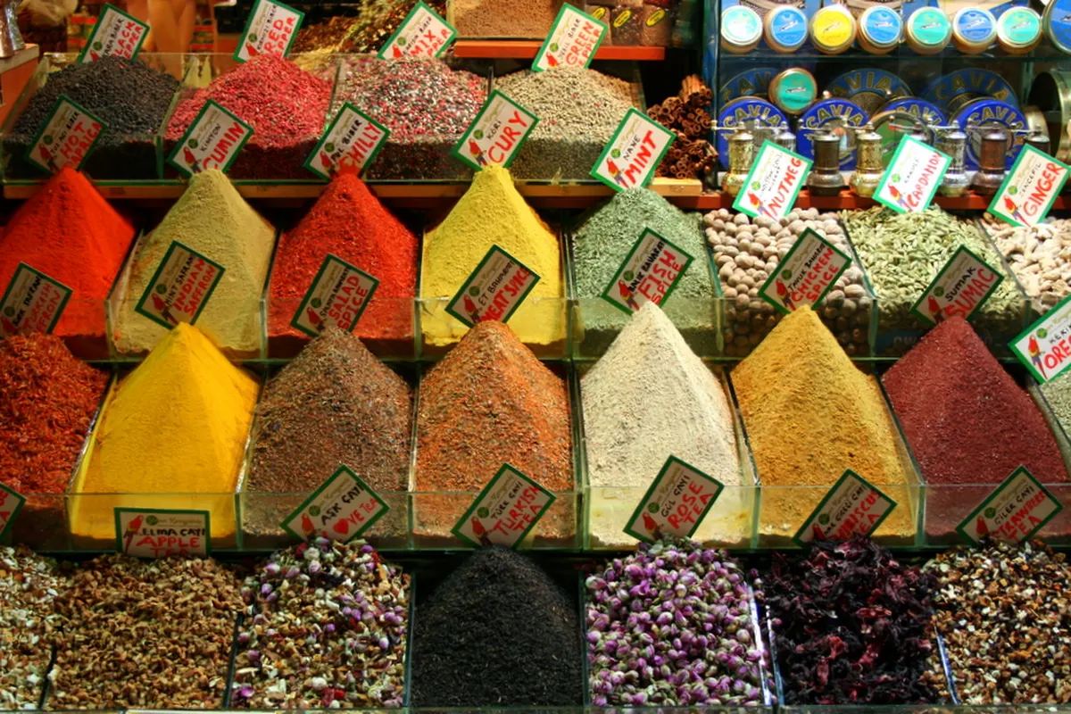 Cones of colourful spices on a market stall