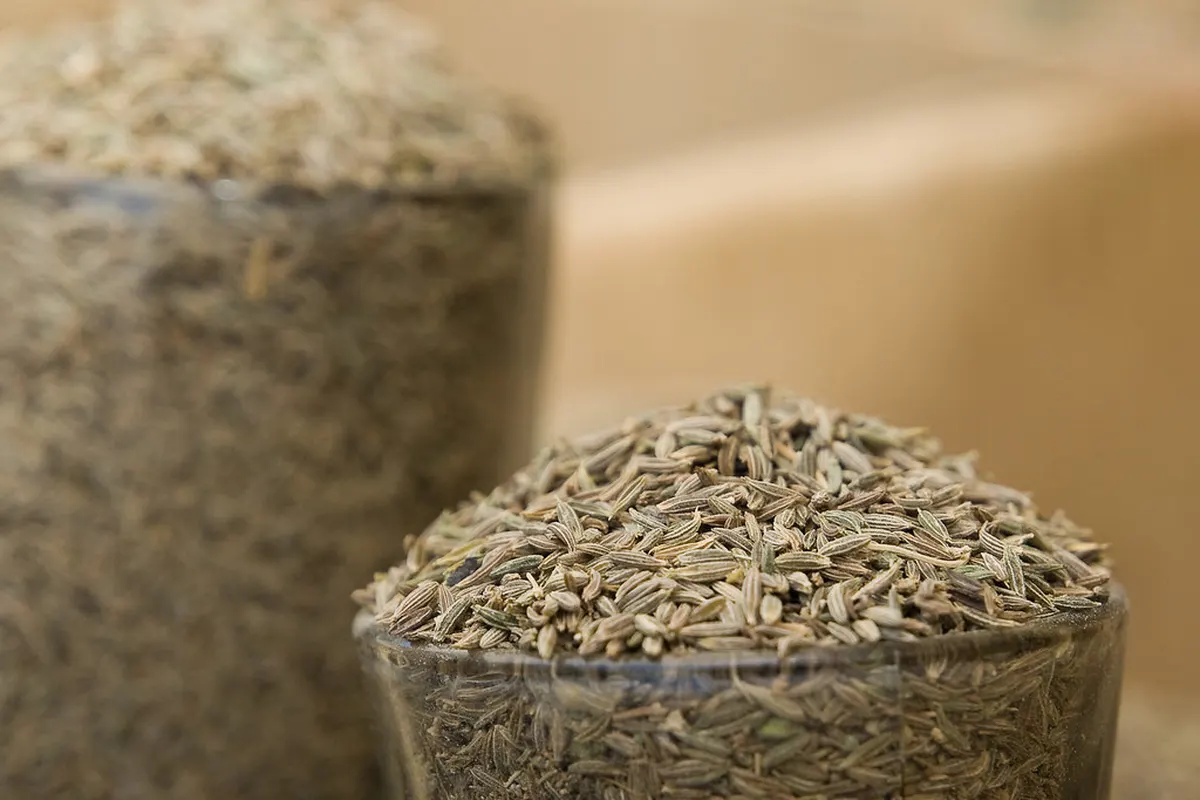 Cumin seeds in a glass bowl, the base of jaljeera