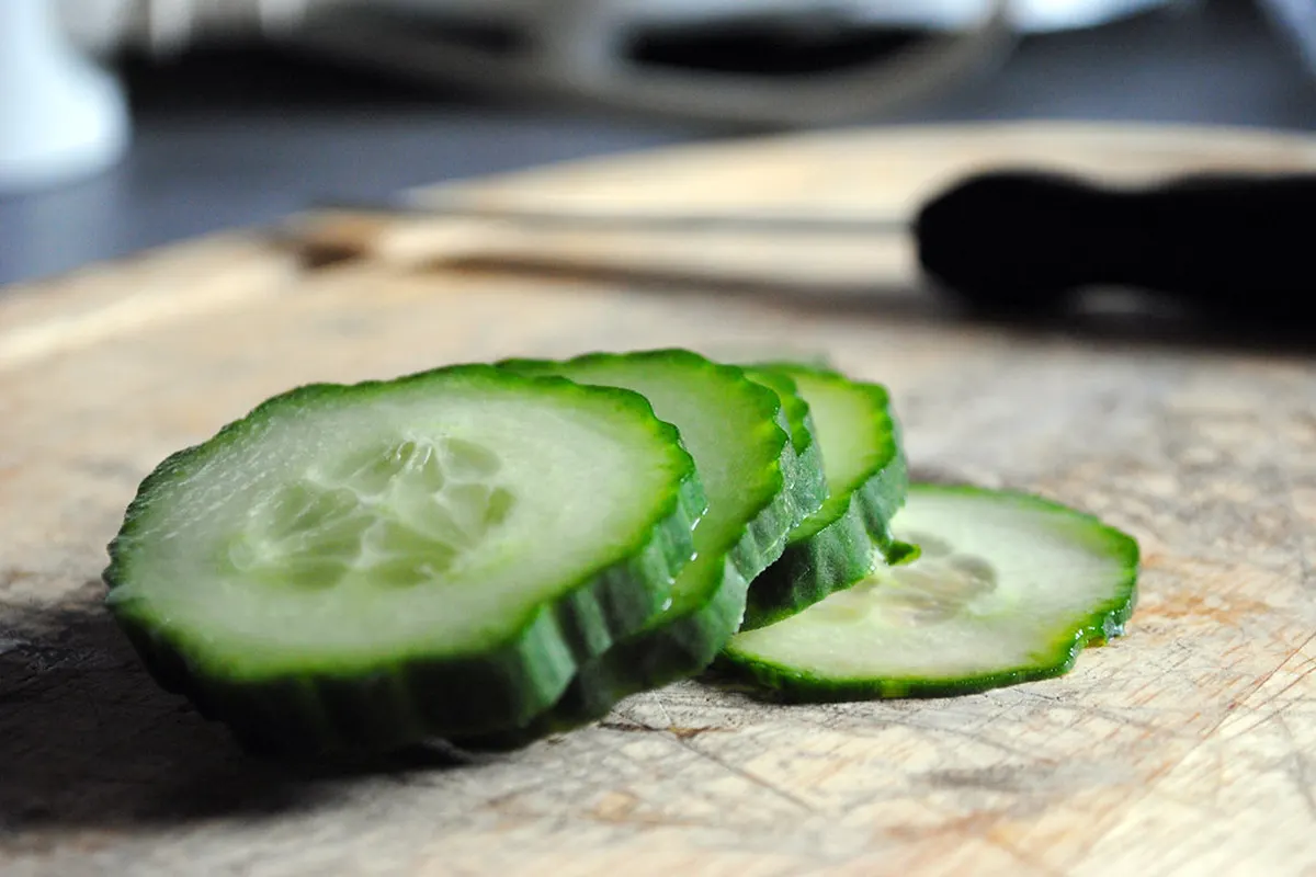 Cucumber slices on a board